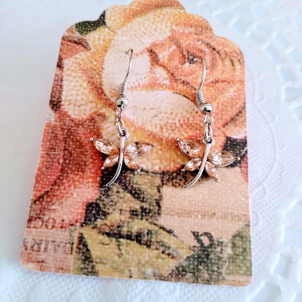 LIGHT PEACH JEWEL BUTTERFLY EARRINGS 🦋. Free mask with purchase.
